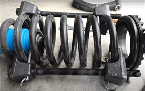 Macpherson fjäderbenskompressor